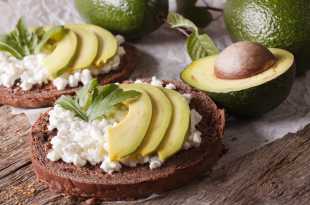 Rye Bread topped with cottage cheese and avocado